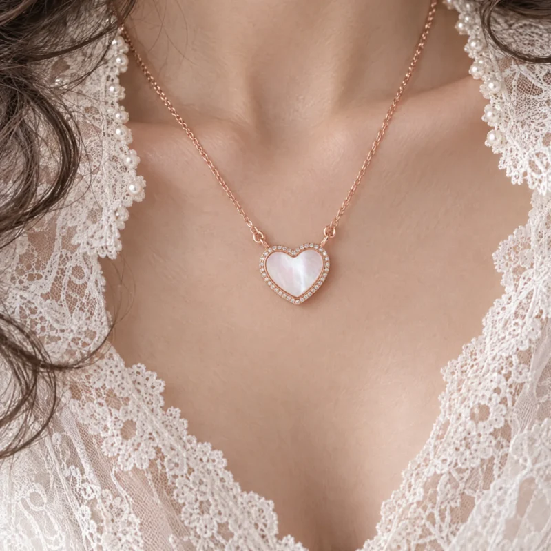 The rose gold heart necklace at a lace collar
