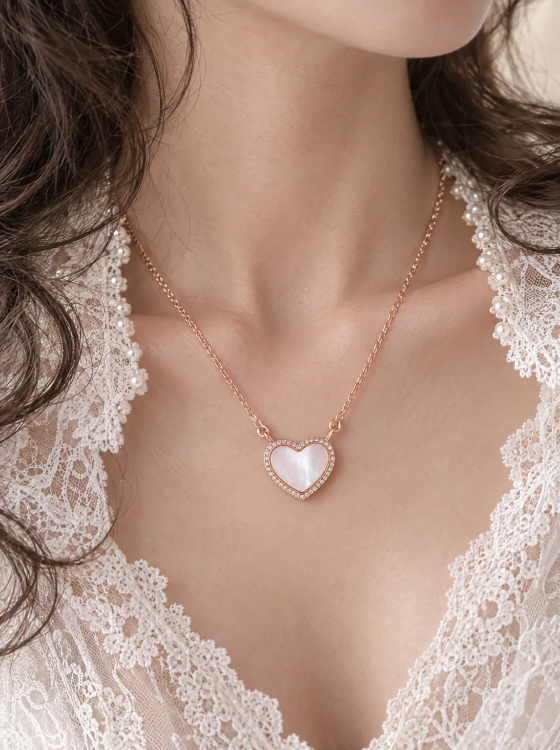 The rose gold heart necklace at a lace collar